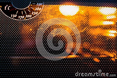 Gas stove oven with blurry background. Abstract red background f Stock Photo