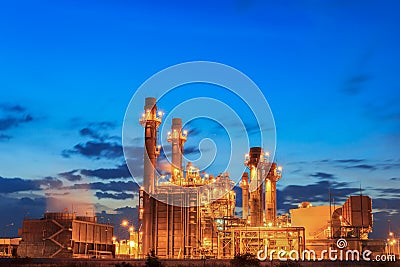 Gas turbine electric power plant with sunset is support all factory in industrial estate Stock Photo