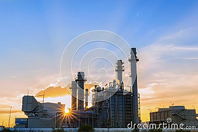 Gas turbine electrical power plant at dusk with twilight support all factory in industrial Estate Stock Photo