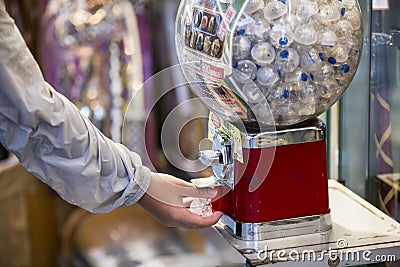 Gashapon Japanese toy vending machine dispenser of children toy in an plastic egg Editorial Stock Photo