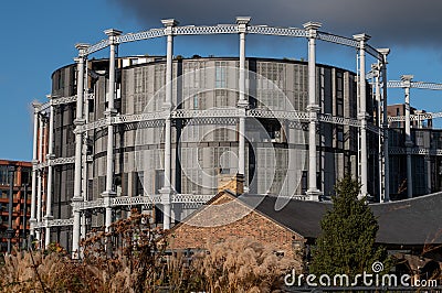 Gasholders building, Kings Cross, London UK, converted into upmarket apartments. Photographed from Bagley Walk. Stock Photo