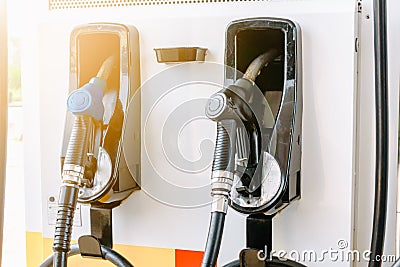 Gasoline Nozzle and Control Panel for Distribution to Vehicle in Gas Station, Hosing Nozzles Fuel for Automotive and Stock Photo