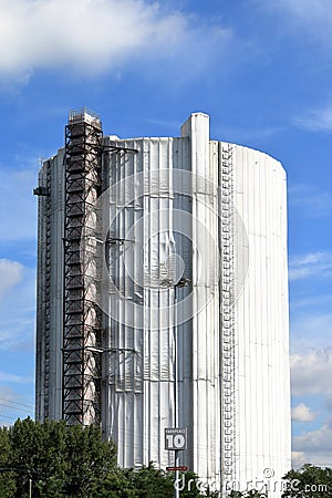 Gasometer in Oberhausen, completely covered due to restoration Stock Photo