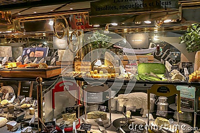 Here is a brief overview of French gastronomy with this presentation of food-filled display cases Editorial Stock Photo