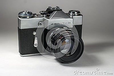 Gatchina, Russia - January 14, 2017: The old Soviet film camera Zenit. Photographed on a bright background. Editorial Stock Photo