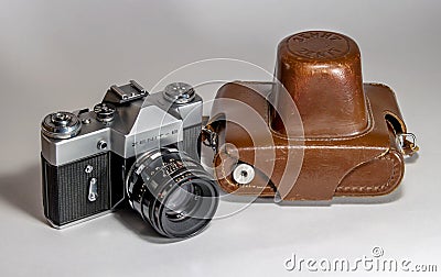Gatchina, Russia - January 14, 2017: The old Soviet film camera Zenit. Photographed on a bright background. Editorial Stock Photo