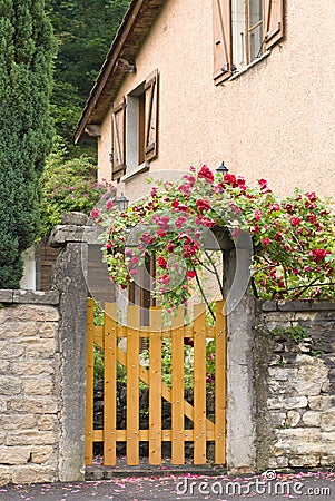 A gate, entrance to a front yard Stock Photo