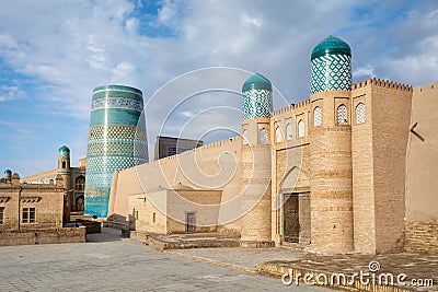 Gate of Kunya-Ark citadel and Kalta Minor minaret in Khiva Stock Photo