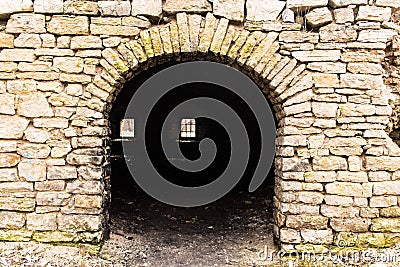 Gate of a medieval industrial building. Stock Photo