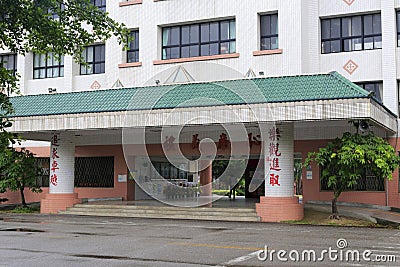 Gate of meilun junior high school in rain Editorial Stock Photo