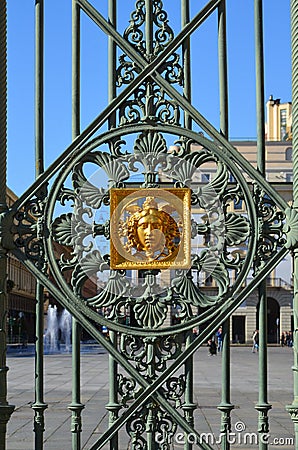The gate of the Royal Palace was made in 1840 by Pelagio Palagi to delimit it from Piazza Castello Editorial Stock Photo