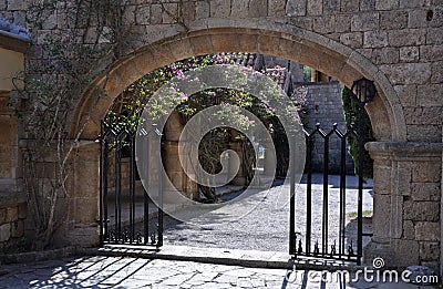 Gated entrance to Courtyard at Ialyssos Monastery Rhodes Stock Photo