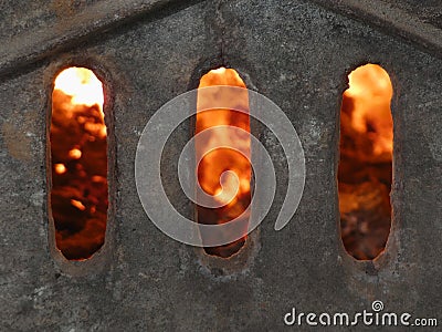 Gates of Hell - Fireplace of Tiled Stove Stock Photo