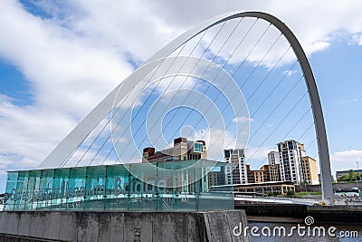 Gateshead Millennium Bridge is a pedestrian and cyclist tilt bridge spanning the River Tyne Editorial Stock Photo