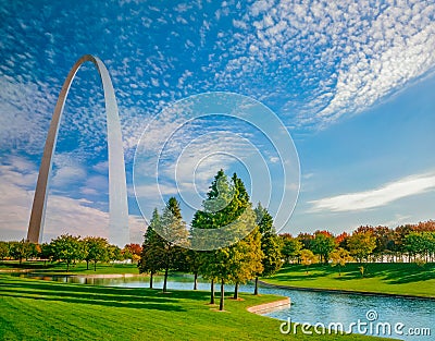 The Gateway Arch is surrounded by the Gateway Arch National Park Stock Photo