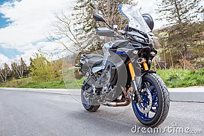 View of new Yamaha Tracer 9 GT motorcycle. Space for text. Beautiful background with Editorial Stock Photo