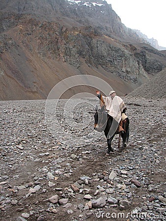 A gaucho riding his horse in Patagonia Editorial Stock Photo