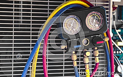 Gauge manifold for measuring pressure in the air conditioning system Stock Photo