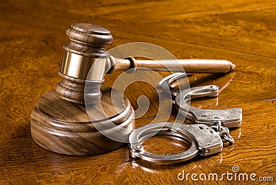Gavel and handcuffs Stock Photo