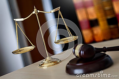 Gavel and legal Judge gavel scales of justice and law working on Stock Photo