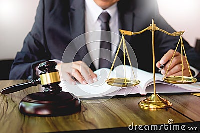 Gavel and soundblock of justice law and lawyer working on wooden desk background Stock Photo