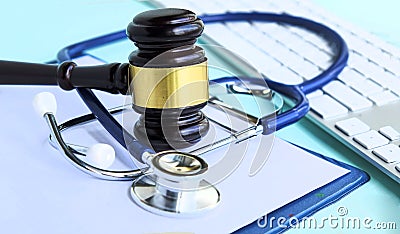 Gavel and stethoscope. medical jurisprudence. legal definition of medical malpractice. attorney. common errors doctors Stock Photo