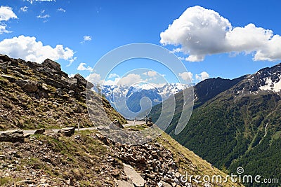 Gavia pass road with panorama view alpine mountains Adamello Alps Stock Photo