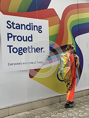 Gay activists with LGBT flags at the Pride parade in London , England 2023 Editorial Stock Photo