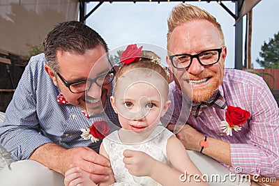 Gay Couple with Little Girl Stock Photo