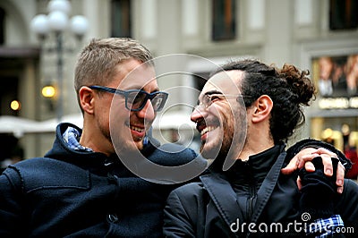 Gay couple smiling on the streets of Florence , Italy Stock Photo
