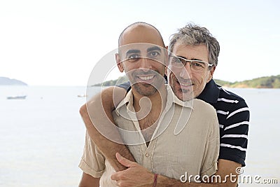 Gay couple on vacation holding hands Stock Photo