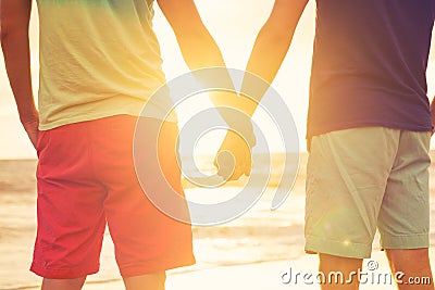 Gay couple watching sunset Stock Photo