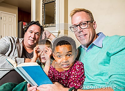 Gay Family Reading Together Stock Photo