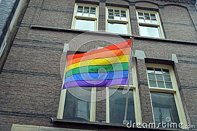 The gay a flag on the house Stock Photo