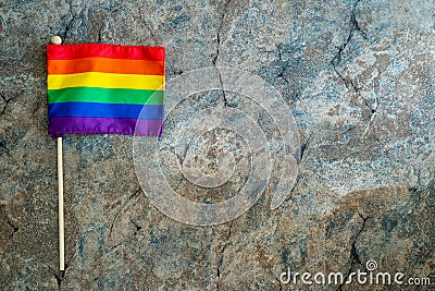 Gay pride concept with a rainbow flag. Useful for lesbian, glbt, bisexual support and gay pride month Stock Photo