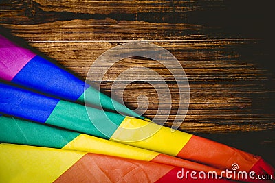 Gay pride flag on wooden table Stock Photo