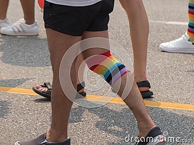 Gay rainbow strap leg male walking pride Editorial Stock Photo