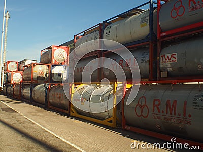 Gaz tanks stacked waiting to be shipped to cargo ship international destination Editorial Stock Photo