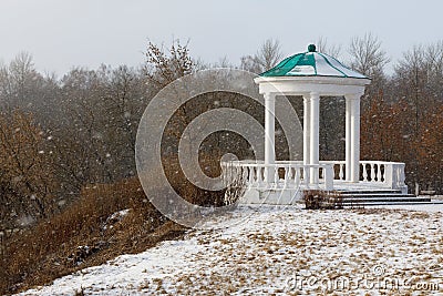 Gazebo in historical park, house of the nobility by a snowy day Stock Photo