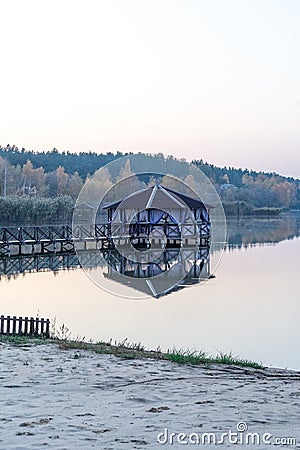 Gazebo on the water. photo of a spacious gazebo in the country Stock Photo