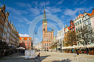 Gdansk, Poland, April 17, 2018: City Hall with spire, clock tower and Facade of beautiful typical colorful houses Editorial Stock Photo