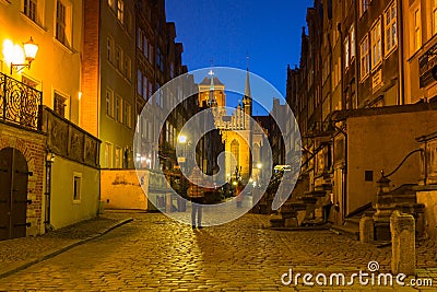 Gdansk, Poland - April 7, 2019: Mariacka street in the old town of Gdansk at night, Poland. Gdansk is the historical capital of Editorial Stock Photo