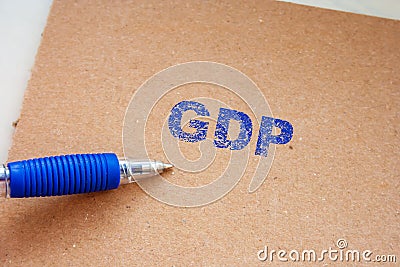 The GDP inscription on note. Word GDP on paper message. gross domestic product Stock Photo