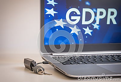 GDPR Concept, laptop with USB, locked with padlock and the key GDPR icon on the laptop screen, Cybersecurity and information Editorial Stock Photo