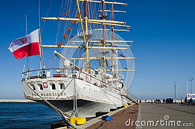 Polish sail training ship Dar Mlodziezy the Gift of Youth in Gdynia port over Baltic Sea Editorial Stock Photo