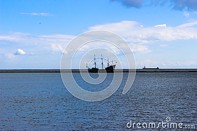 Gdynia, Poland - View for Baltic Sea with sailing ship Black Pearl polish: Czarna Perla Editorial Stock Photo