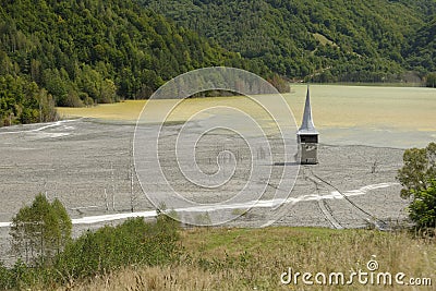 Geamana Church on polluted lake Stock Photo