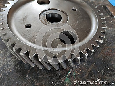 gear teeth damaged due to imperfect backlash on the heavy equipment timing gear Stock Photo