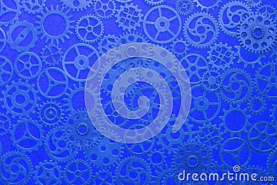 Gears, abstract background, lots of little gears with a blue tinge, steampunk Stock Photo