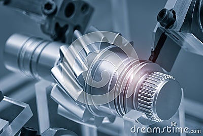 Gears, impaled on the shaft spline. Replacement spare part of the machine tool Stock Photo